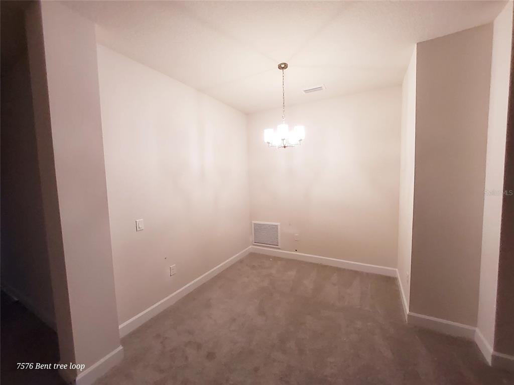 7576 Bent Tree Loop St. Cloud, FL 34773 - Photo 5 of 18 a view of an empty room