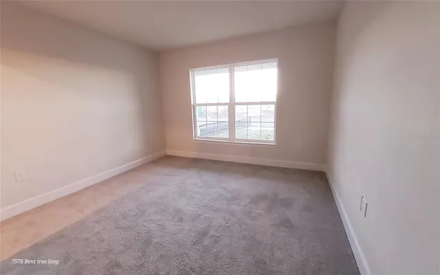 an empty room with a window