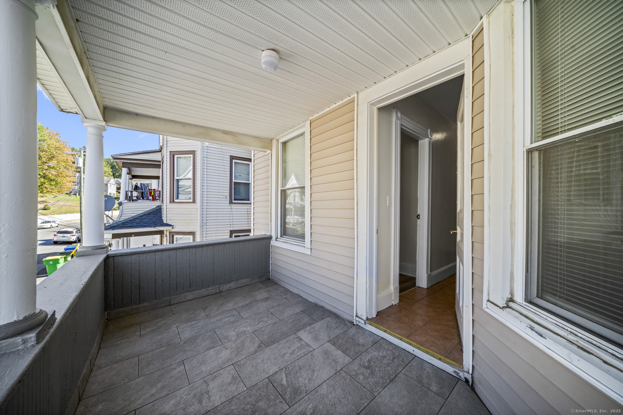 217 Woodlawn Terrace Waterbury, CT 06710 - Photo 6 of 9 a living room with furniture and a window