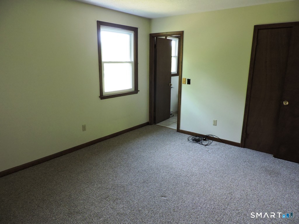 269 Griffin Road South Windsor, CT 06074 - Photo 15 of 36 an empty room with windows