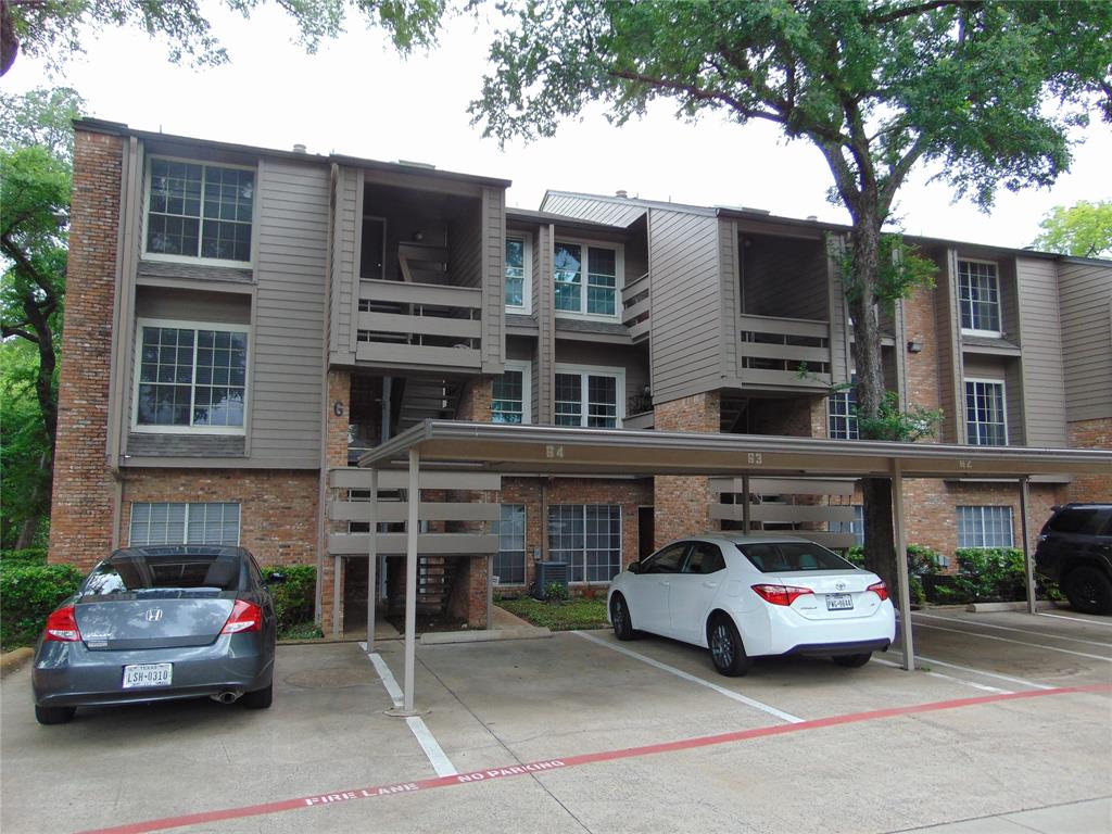 a car parked in front of a building