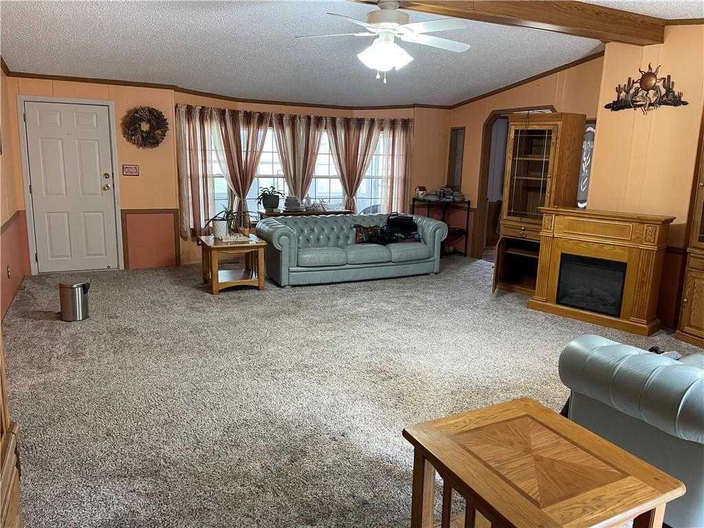 168 Big Rock Road Berlin, PA 15530 - Photo 18 of 25 a living room with furniture and a fireplace