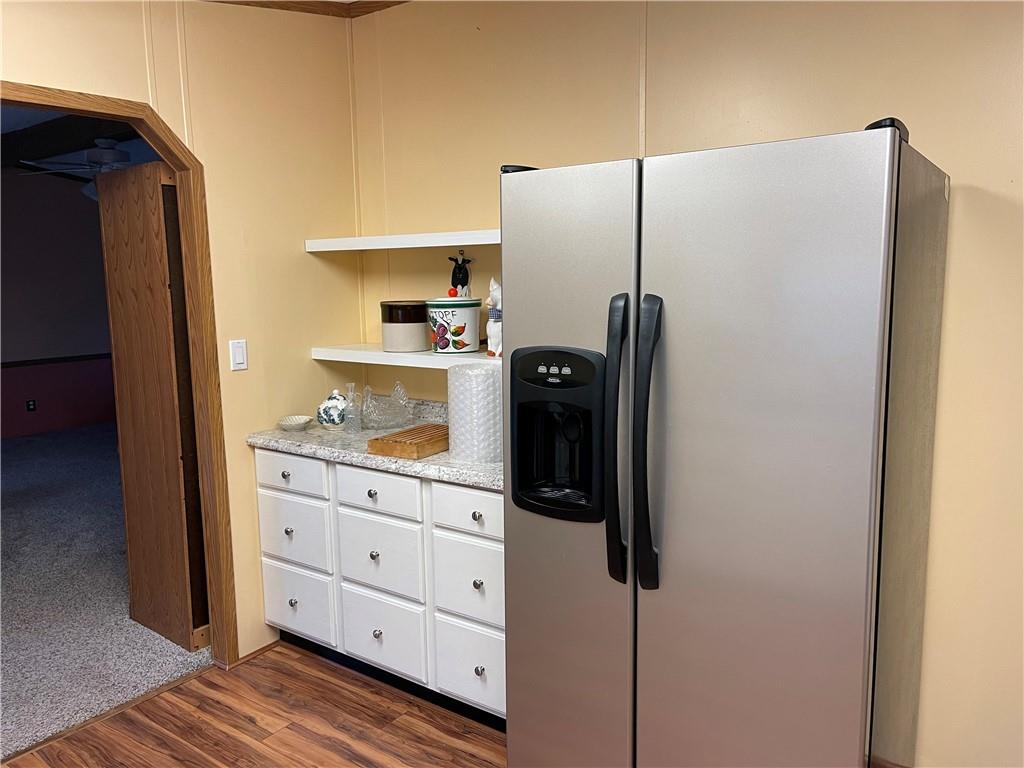 168 Big Rock Road Berlin, PA 15530 - Photo 25 of 25 a kitchen with a refrigerator and cabinets