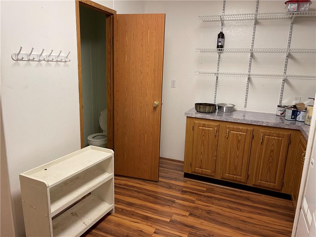 168 Big Rock Road Berlin, PA 15530 - Photo 6 of 25 a room with a wooden floor and utility room
