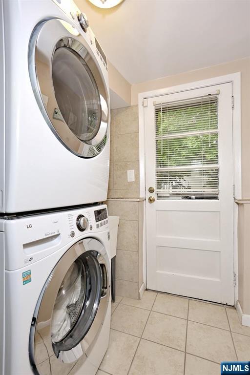 30 Brookfield Road Dumont, NJ 07628 - Photo 27 of 50 a utility room with dryer and washer