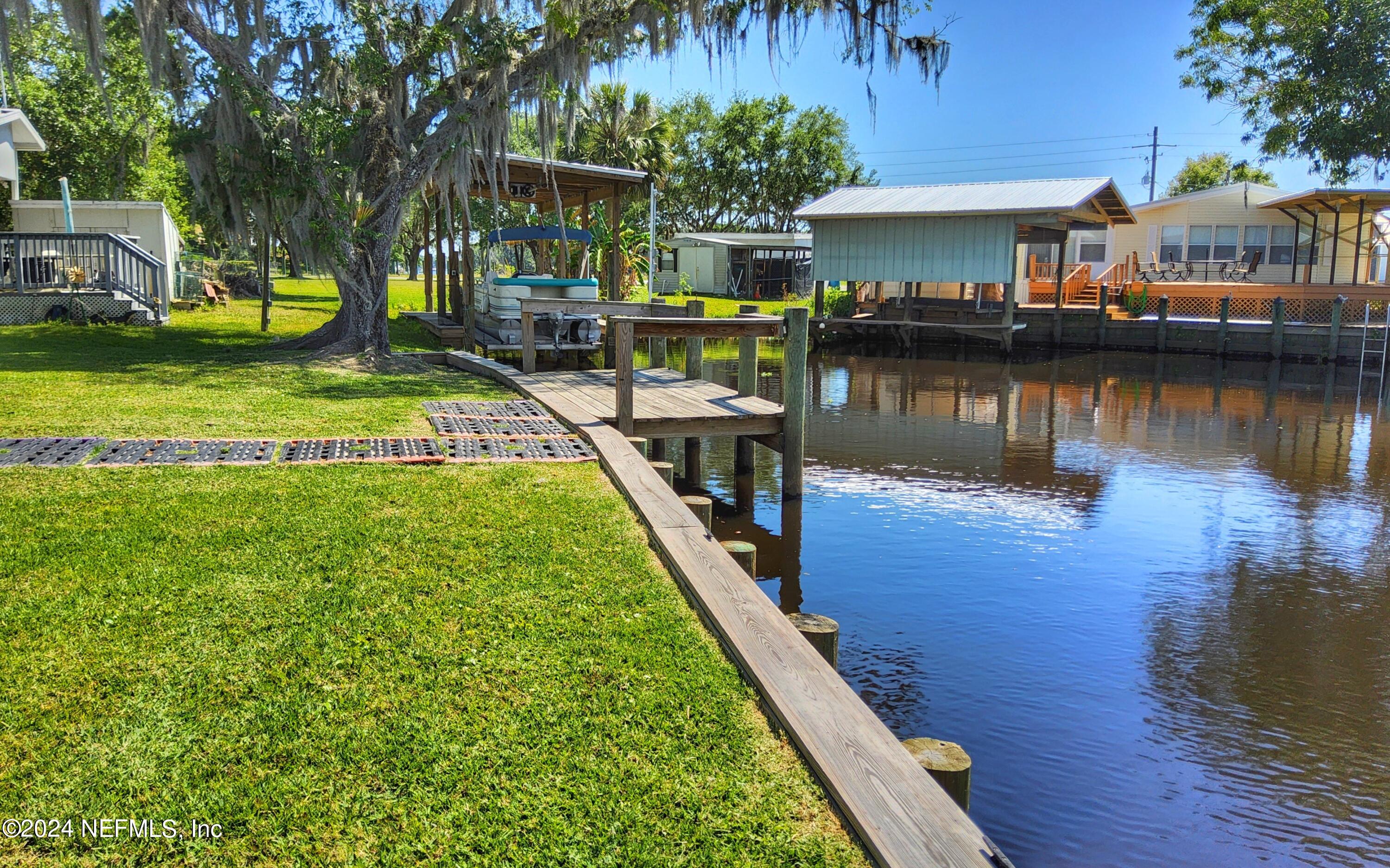 44 Scott Welaka, FL 32193 - Photo 12 of 35 a view of a lake with houses