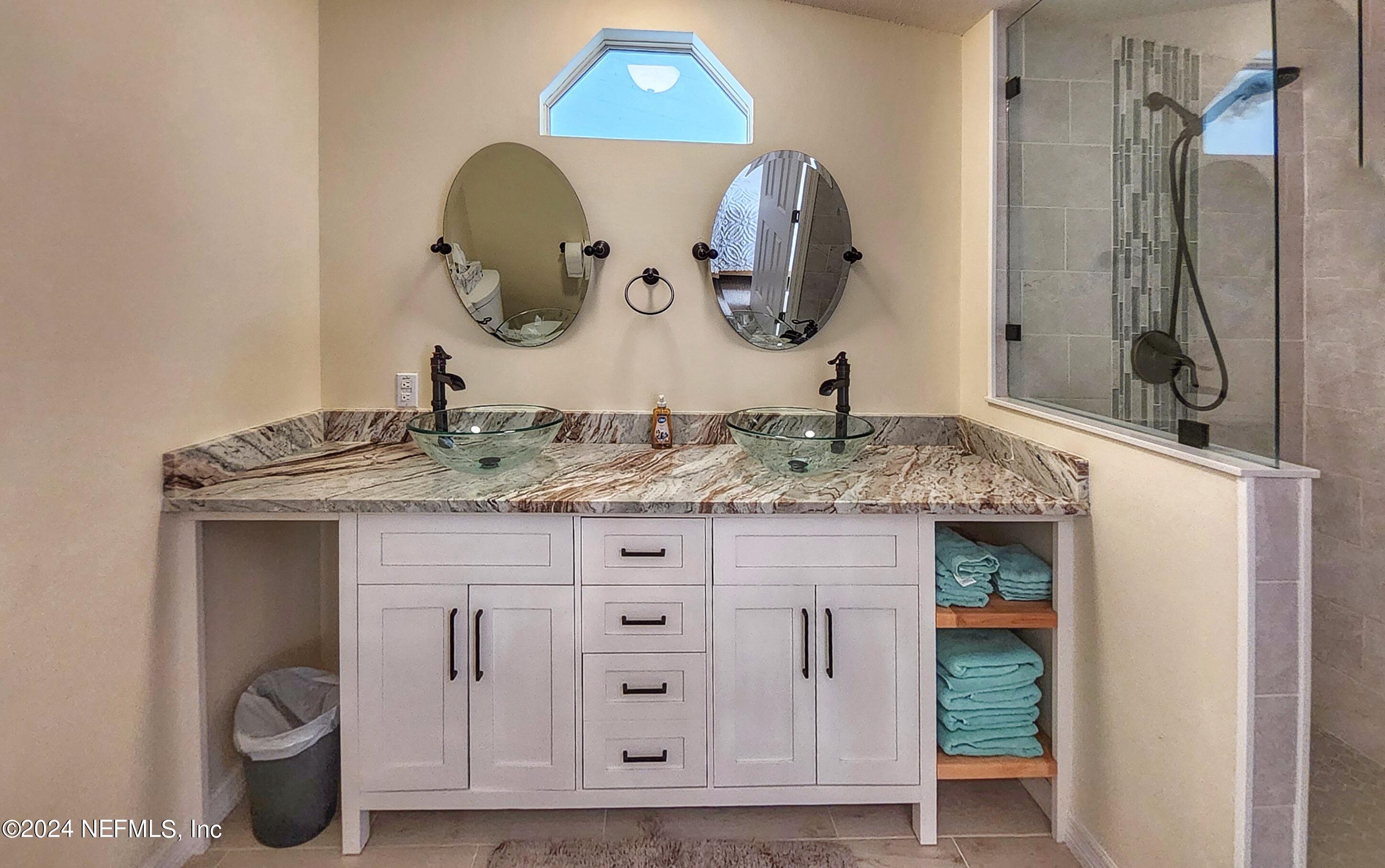 44 Scott Welaka, FL 32193 - Photo 35 of 35 a bathroom with a granite countertop sink and a mirror