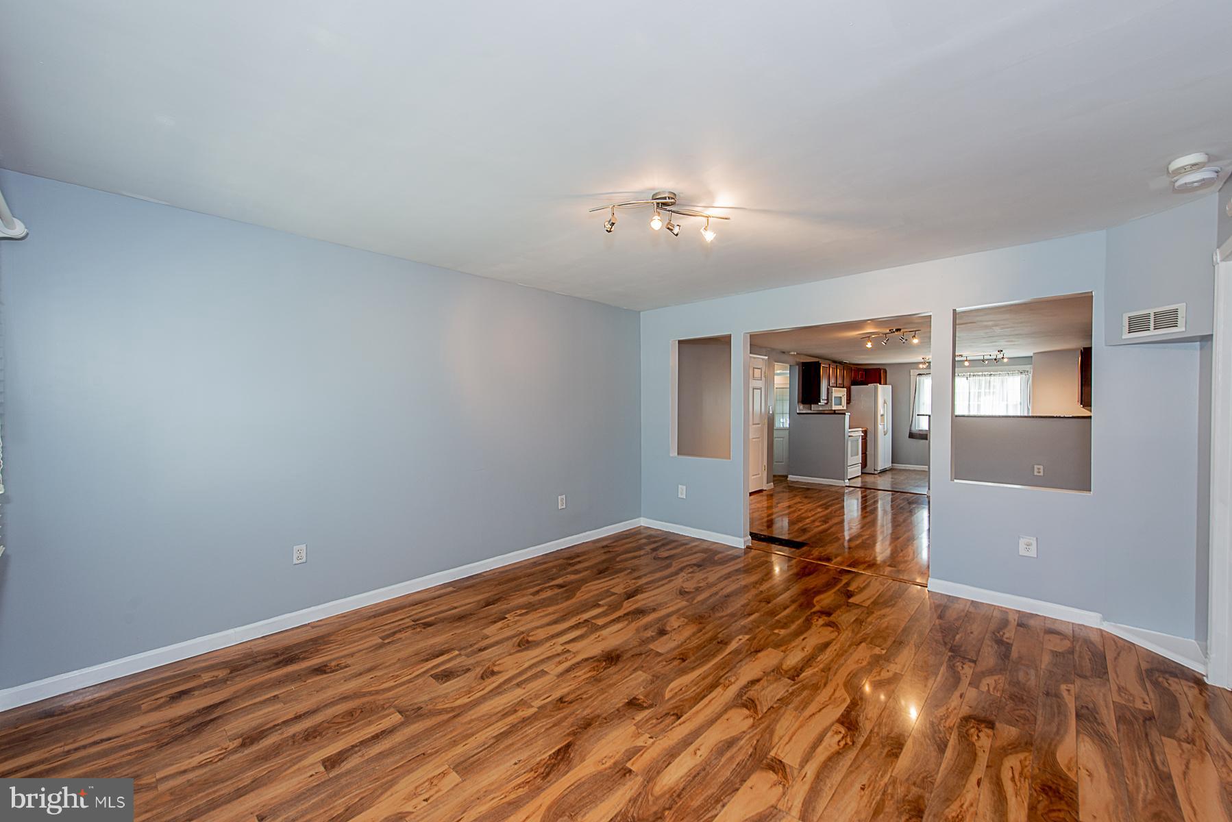 2413 Brunswick Road Baltimore, MD 21227 - Photo 30 of 30 Living Room / View Of Open Floor Plan
