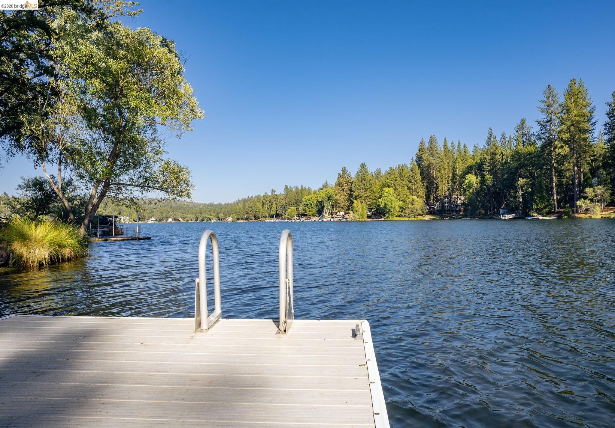 19711 Pleasantview Drive Groveland, CA 95321 - Photo 35 of 39 Waterfront property featuring a dock with metal handrails