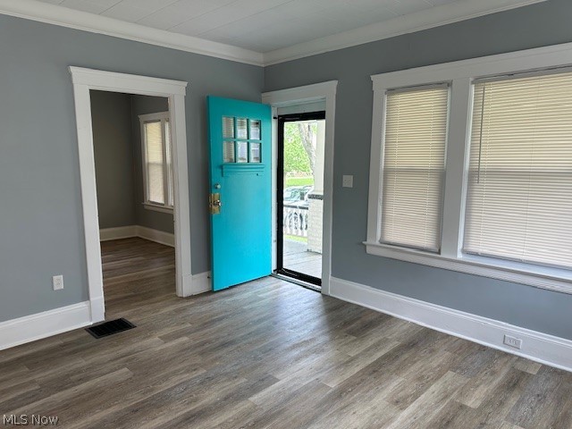1388 Brookline Road Cleveland, OH 44121 - Photo 3 of 30 Entrance foyer with dark hardwood / wood-style flooring and ornamental molding