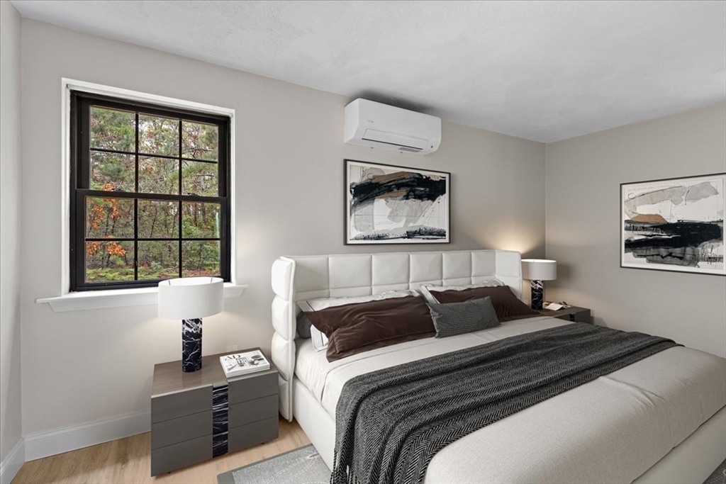 35 Ashumet Road, Unit 11B Mashpee, MA 02649 - Photo 18 of 24 a bedroom with a bed and a window