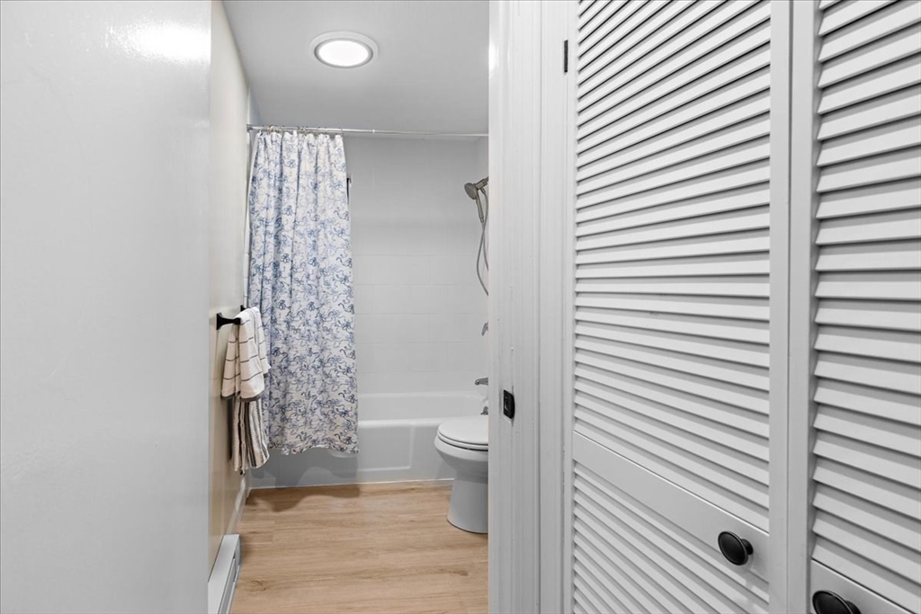 35 Ashumet Road, Unit 11B Mashpee, MA 02649 - Photo 22 of 24 a bathroom with a shower and a toilet