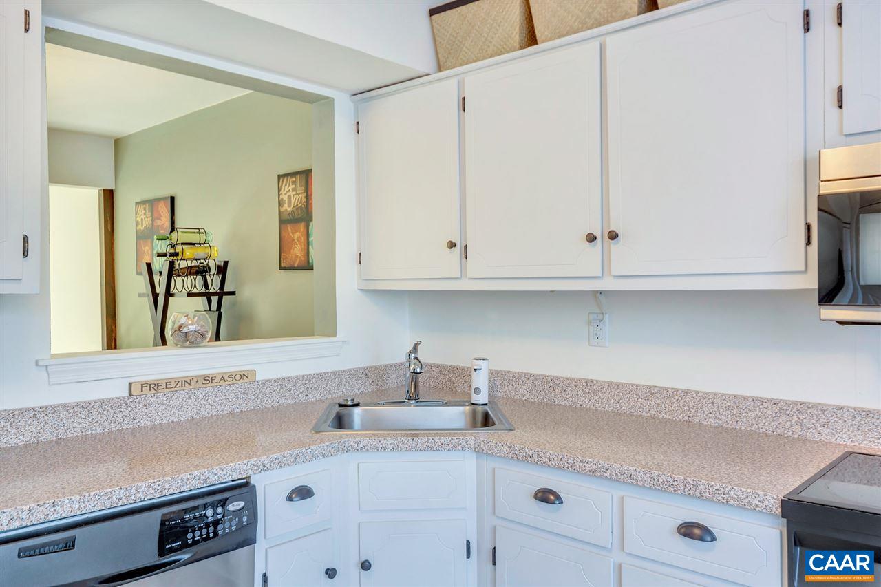 1554 Cool Spring Road Charlottesville, VA 22901 - Photo 6 of 21 a kitchen with granite countertop white cabinets and a sink