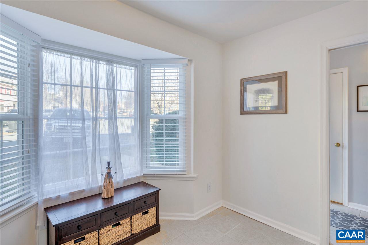 1554 Cool Spring Road Charlottesville, VA 22901 - Photo 7 of 21 a view of a workspace with furniture and a window