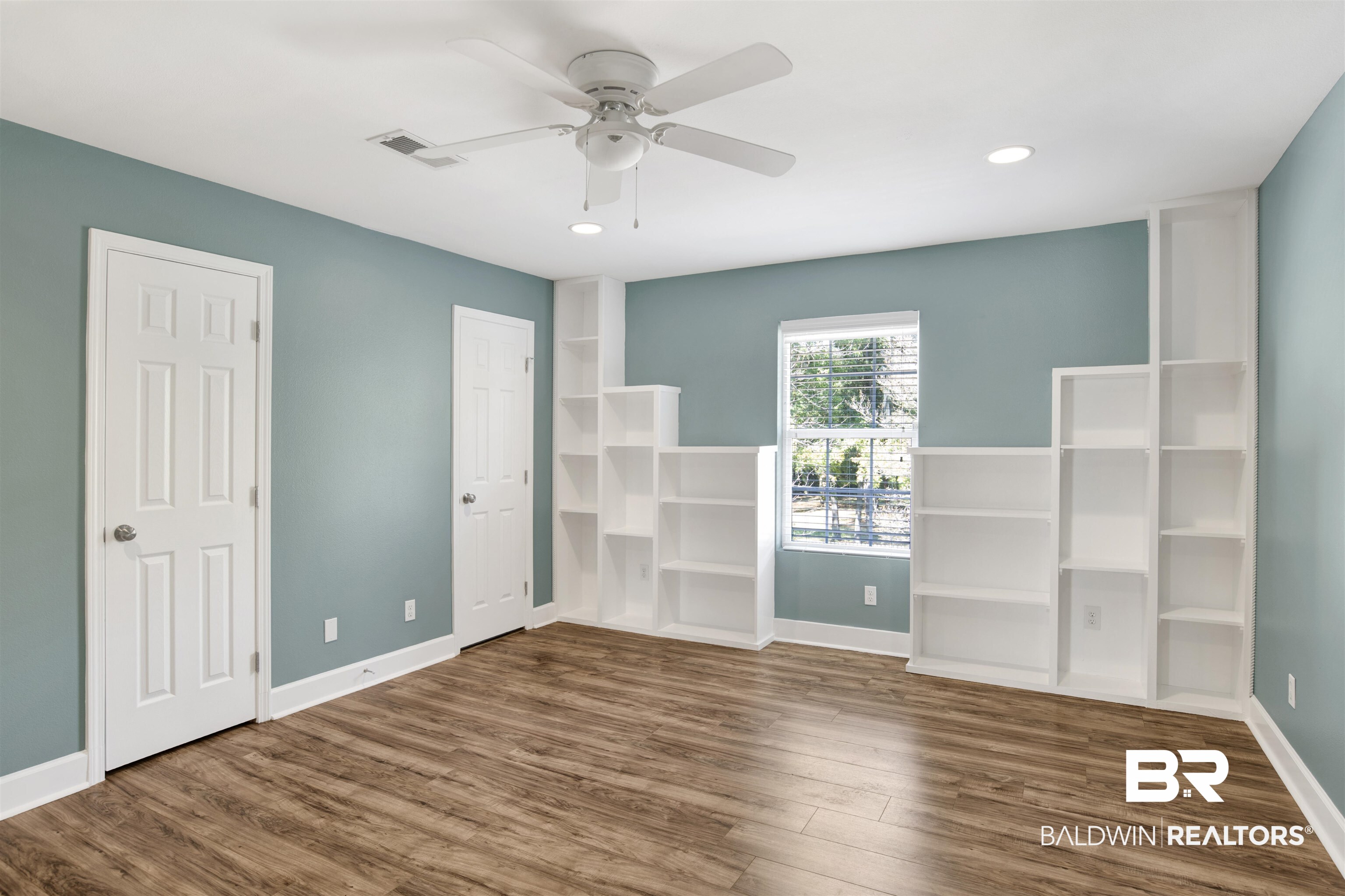 11835 Island Drive Foley, AL 36535 - Photo 36 of 53 Empty room featuring dark wood-style floors, recessed lighting, and a ceiling fan
