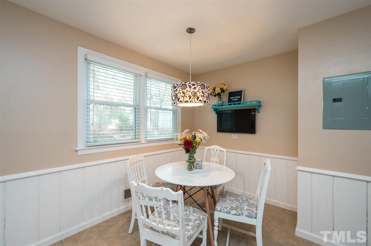 2213 Mossbank Road Raleigh, NC 27604 - Photo 16 of 28 a dining room with furniture and window