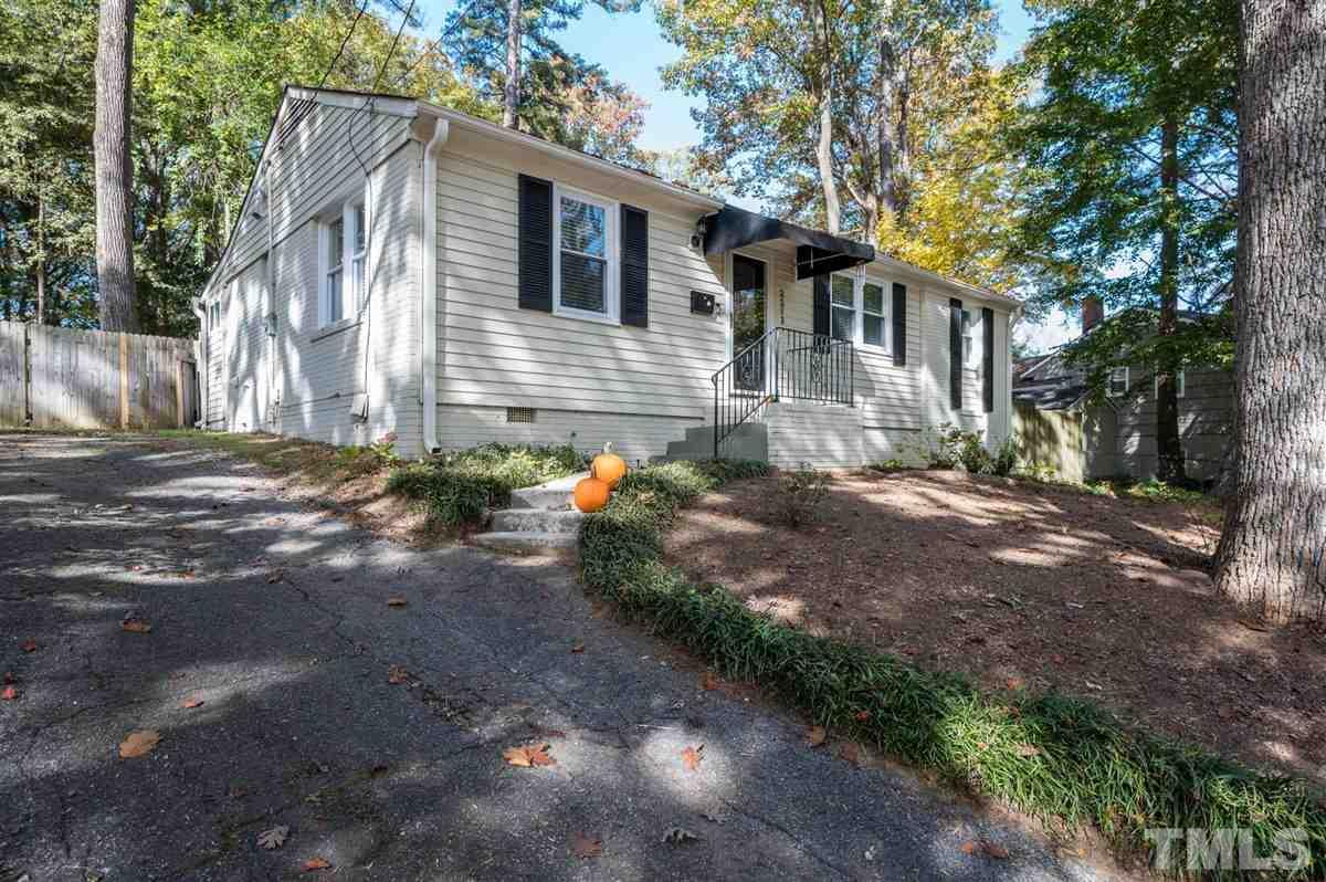 2213 Mossbank Road Raleigh, NC 27604 - Photo 3 of 28 a view of a house with a yard