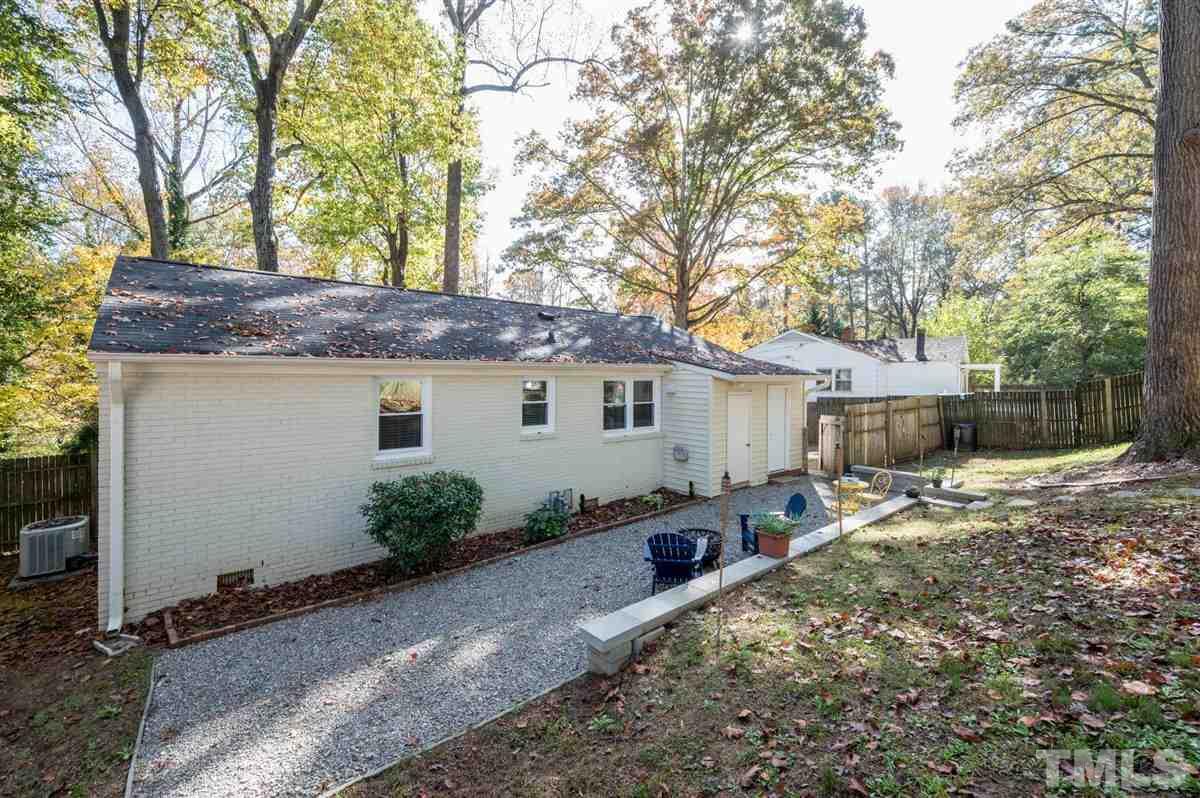 2213 Mossbank Road Raleigh, NC 27604 - Photo 25 of 28 a backyard of house with seating space