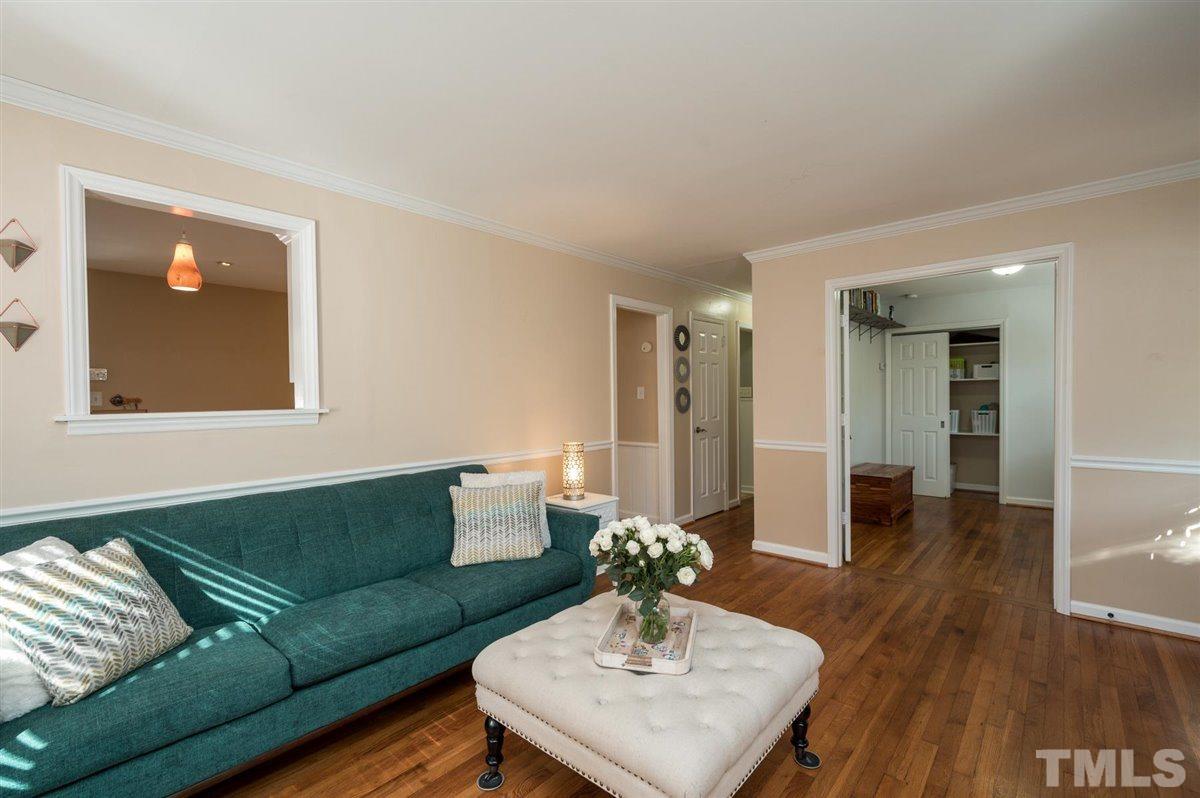 2213 Mossbank Road Raleigh, NC 27604 - Photo 8 of 28 a living room with furniture and wooden floor