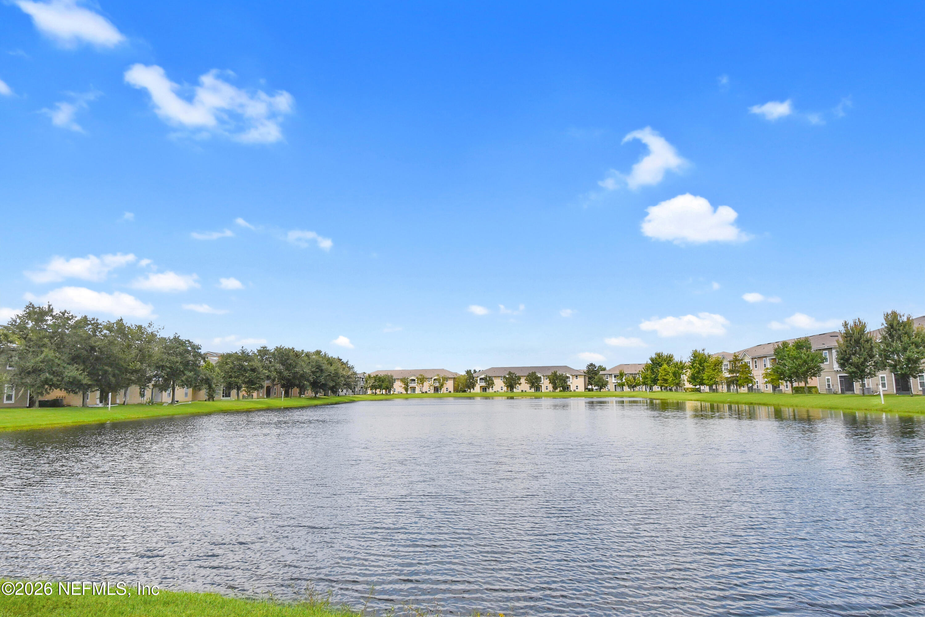 2334 Golden Lake Loop St. Augustine, FL 32084 - Photo 21 of 31 a view of a lake with a big yard