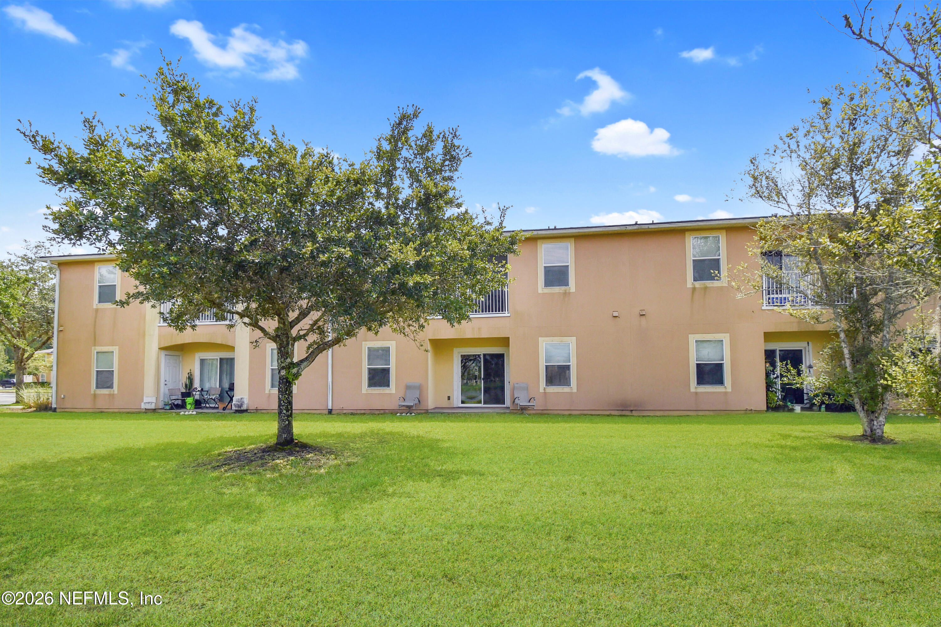 2334 Golden Lake Loop St. Augustine, FL 32084 - Photo 22 of 31 a front view of house with yard and green space