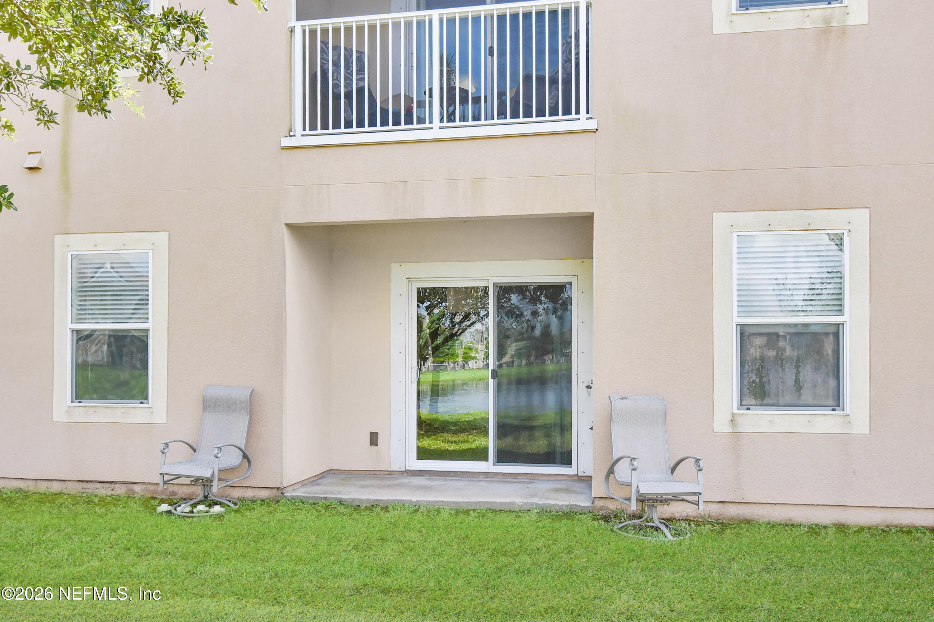 2334 Golden Lake Loop St. Augustine, FL 32084 - Photo 23 of 31 a front view of a house with garden