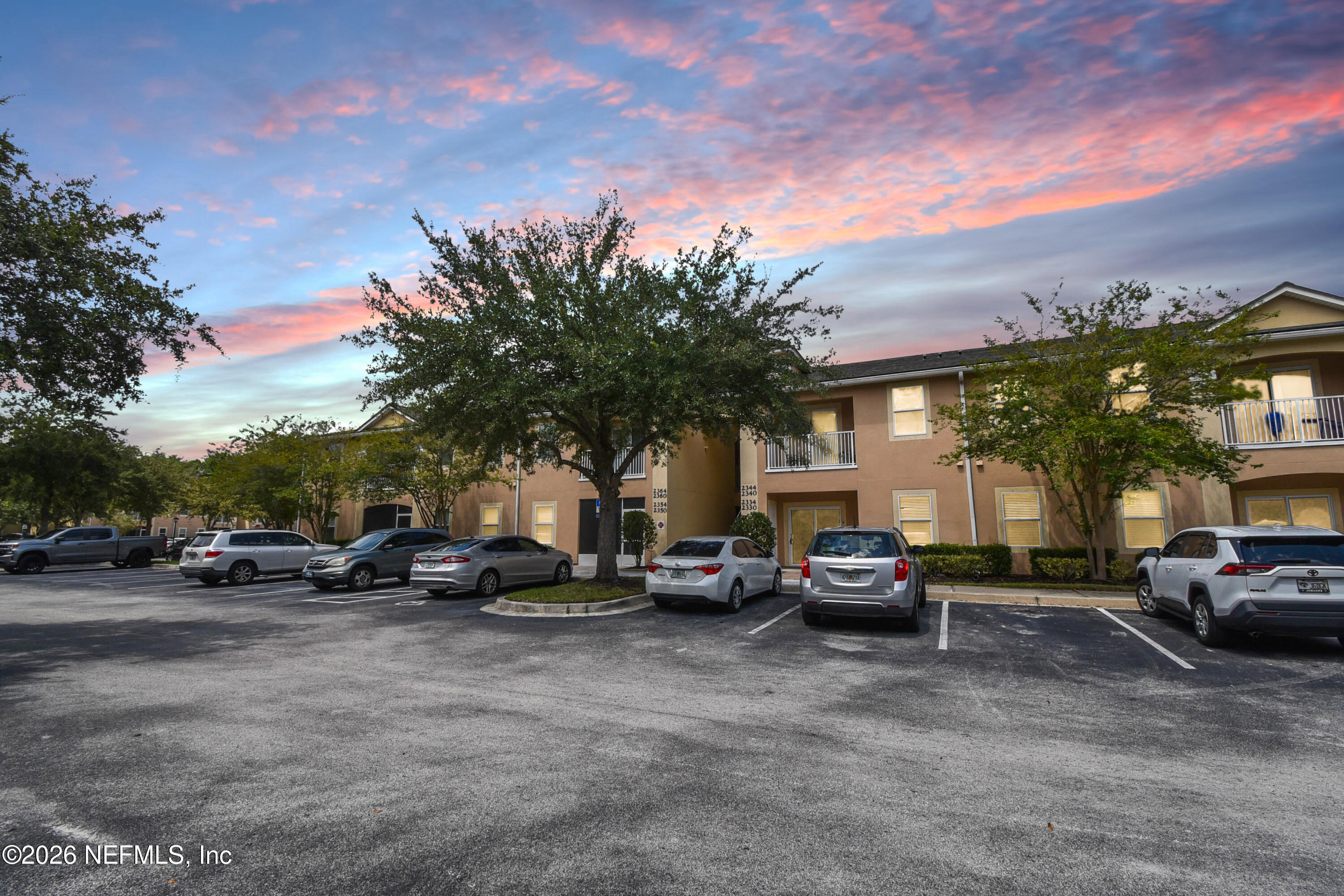 2334 Golden Lake Loop St. Augustine, FL 32084 - Photo 26 of 31 a view of a cars park in front of a house