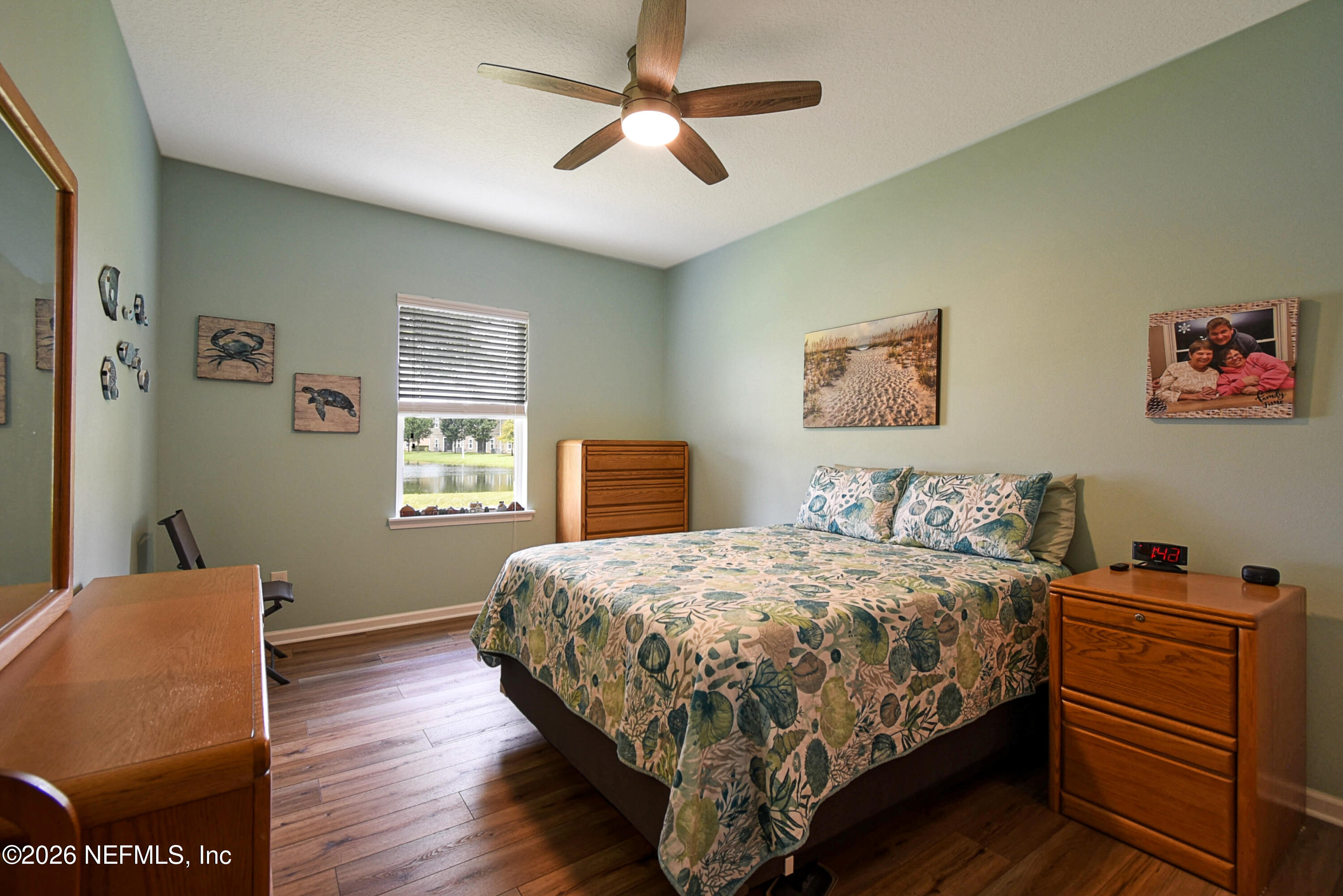 2334 Golden Lake Loop St. Augustine, FL 32084 - Photo 3 of 31 a bedroom with a bed and a dresser