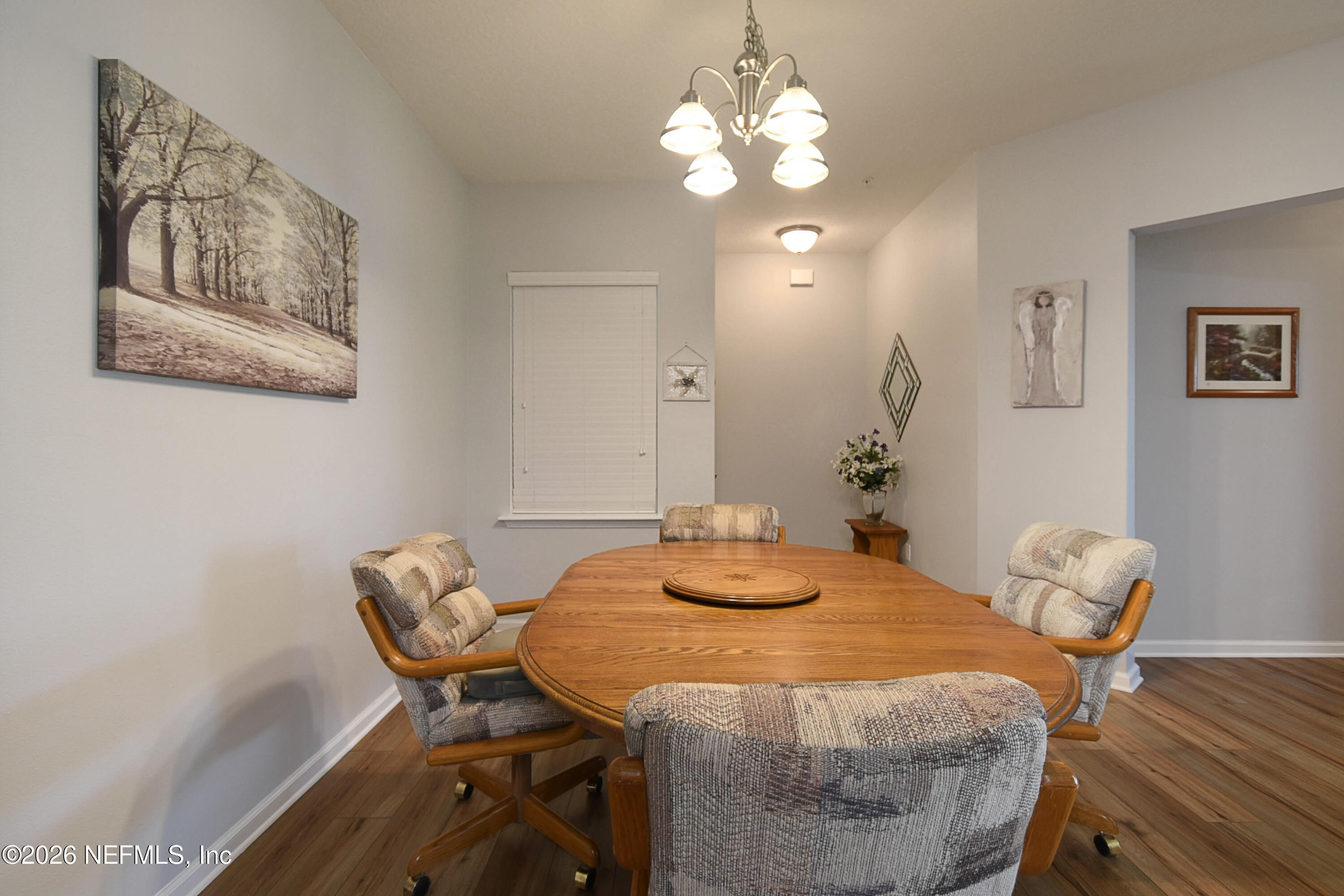2334 Golden Lake Loop St. Augustine, FL 32084 - Photo 7 of 31 a view of a dining room with furniture and wooden floor