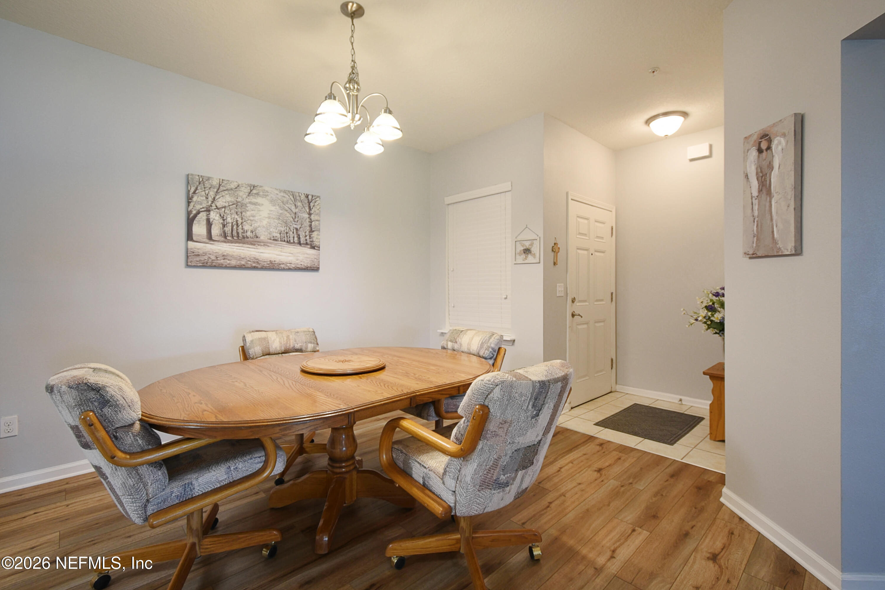 2334 Golden Lake Loop St. Augustine, FL 32084 - Photo 8 of 31 a view of a dining room with furniture and wooden floor