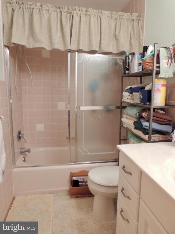 6782 Bent Pine Road Willards, MD 21874 - Photo 14 of 21 a bathroom with a toilet and a shower