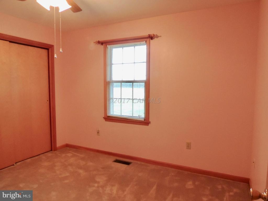 6782 Bent Pine Road Willards, MD 21874 - Photo 16 of 21 a view of an empty room with a window