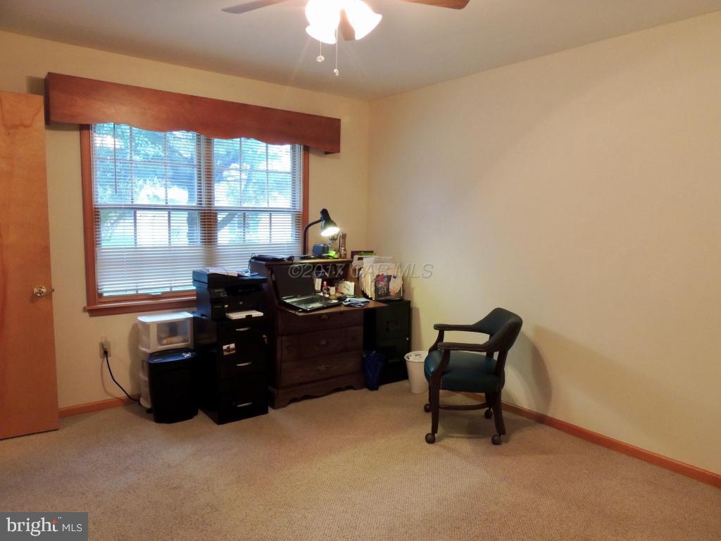 6782 Bent Pine Road Willards, MD 21874 - Photo 17 of 21 a room with furniture and windows