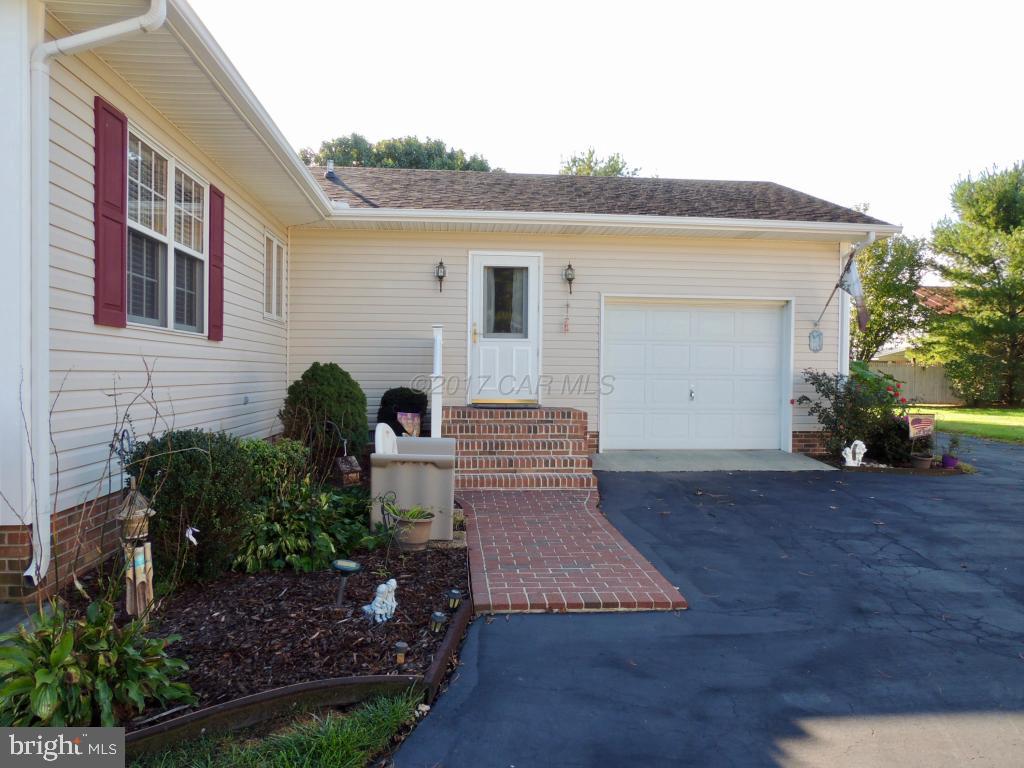 6782 Bent Pine Road Willards, MD 21874 - Photo 19 of 21 a view of a house with backyard and garden