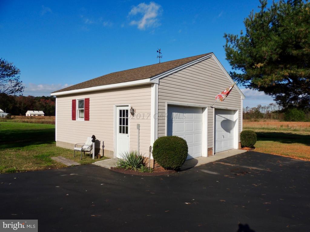 6782 Bent Pine Road Willards, MD 21874 - Photo 20 of 21 a view of a house with a yard