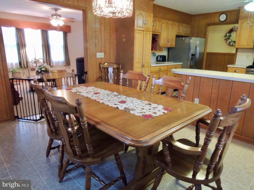 6782 Bent Pine Road Willards, MD 21874 - Photo 8 of 21 a view of a dining room with furniture and window