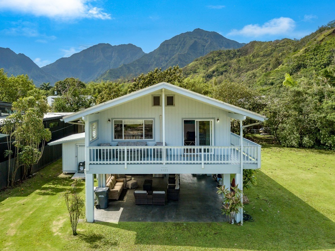 5527 Weke Road Hanalei, HI 96714 - Photo 2 of 28 a view of a house with a yard deck and furniture