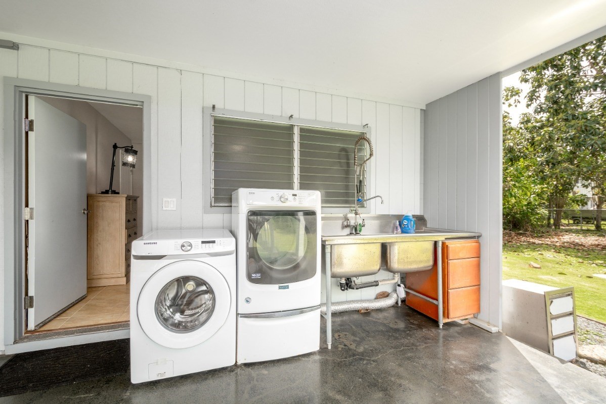 5527 Weke Road Hanalei, HI 96714 - Photo 22 of 28 a utility room with dryer and washer