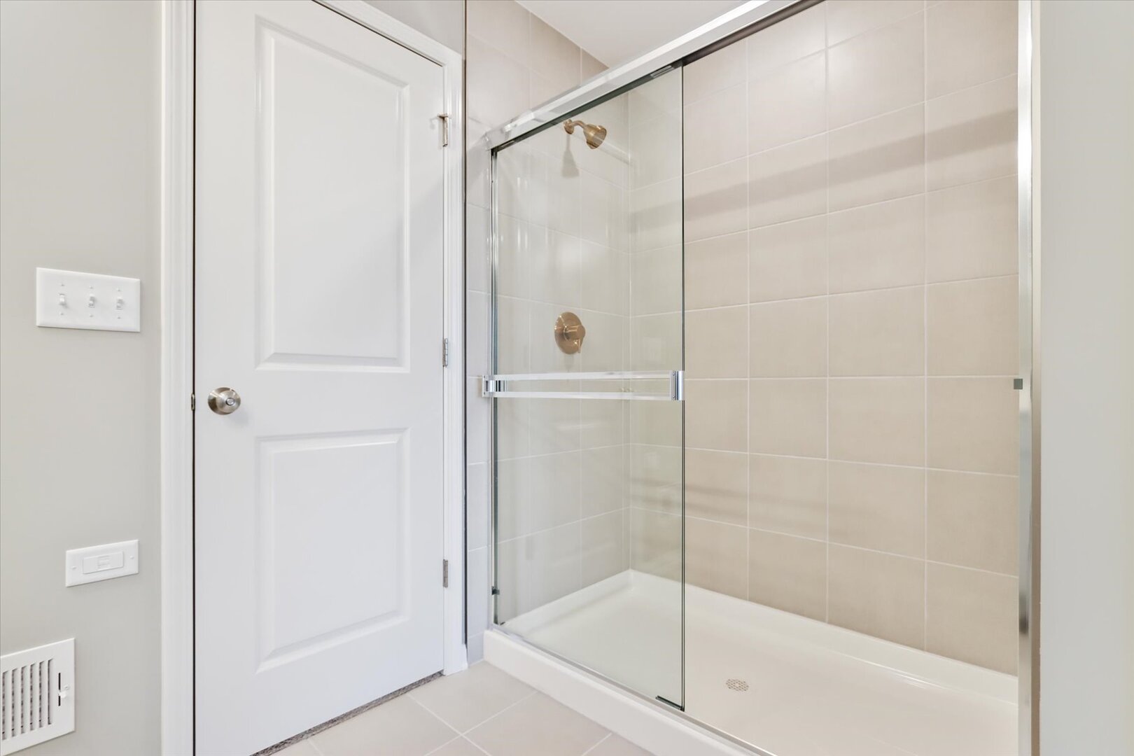 500 Endicott Road South Elgin, IL 60177 - Photo 22 of 30 a bathroom with a glass shower door