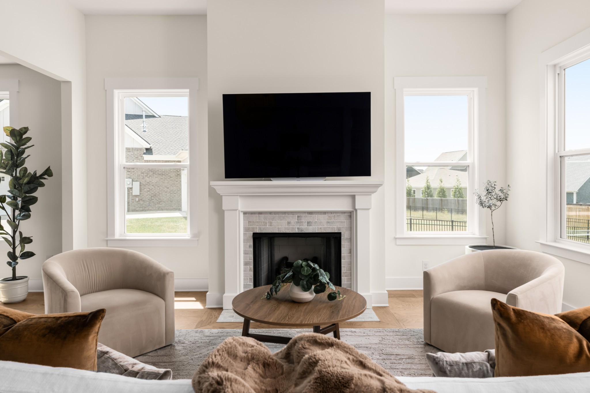 3024 Shandor St Spring Hill Spring Hill, TN 37174 - Photo 17 of 63 a living room with furniture a flat screen tv and a fireplace