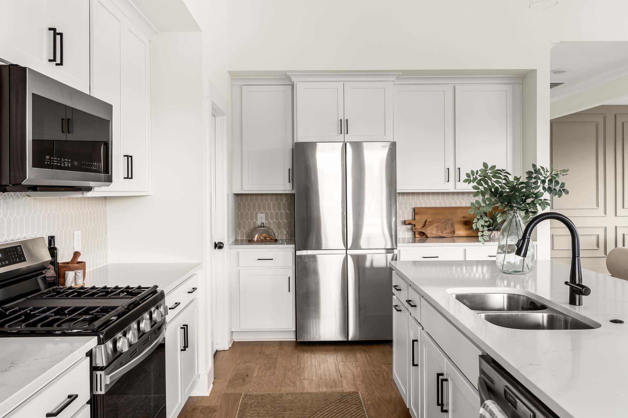 3024 Shandor St Spring Hill Spring Hill, TN 37174 - Photo 22 of 63 a kitchen with appliances a sink and a counter space