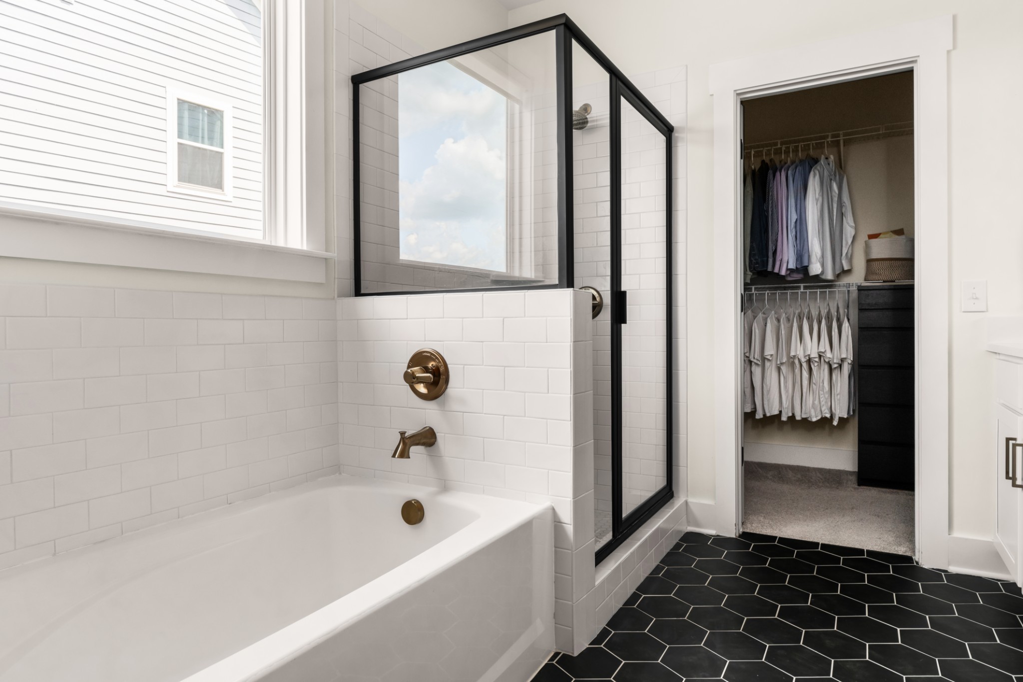 3024 Shandor St Spring Hill Spring Hill, TN 37174 - Photo 33 of 63 a bathroom with a bathtub and a shower