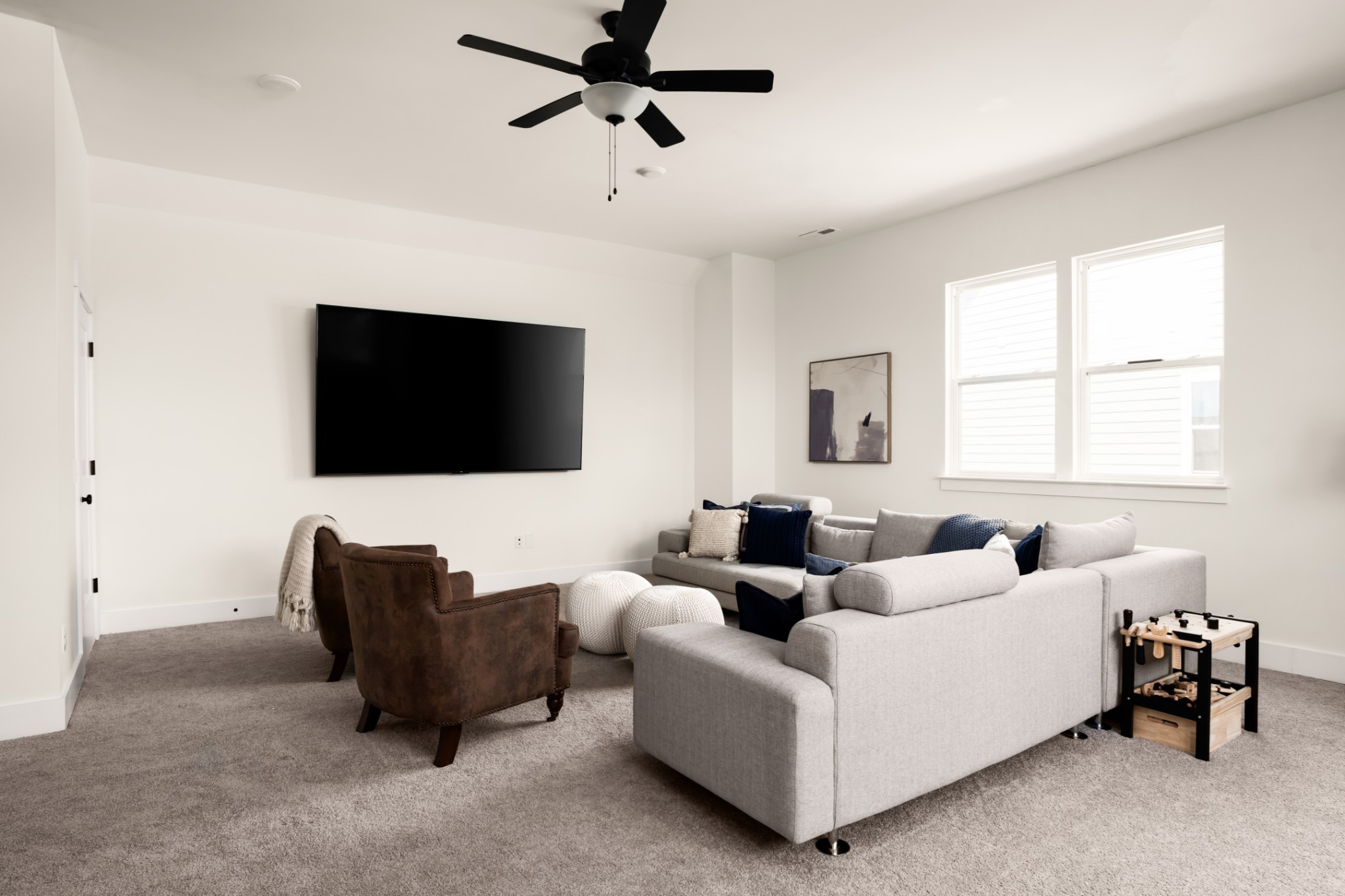 3024 Shandor St Spring Hill Spring Hill, TN 37174 - Photo 36 of 63 a living room with furniture and a flat screen tv
