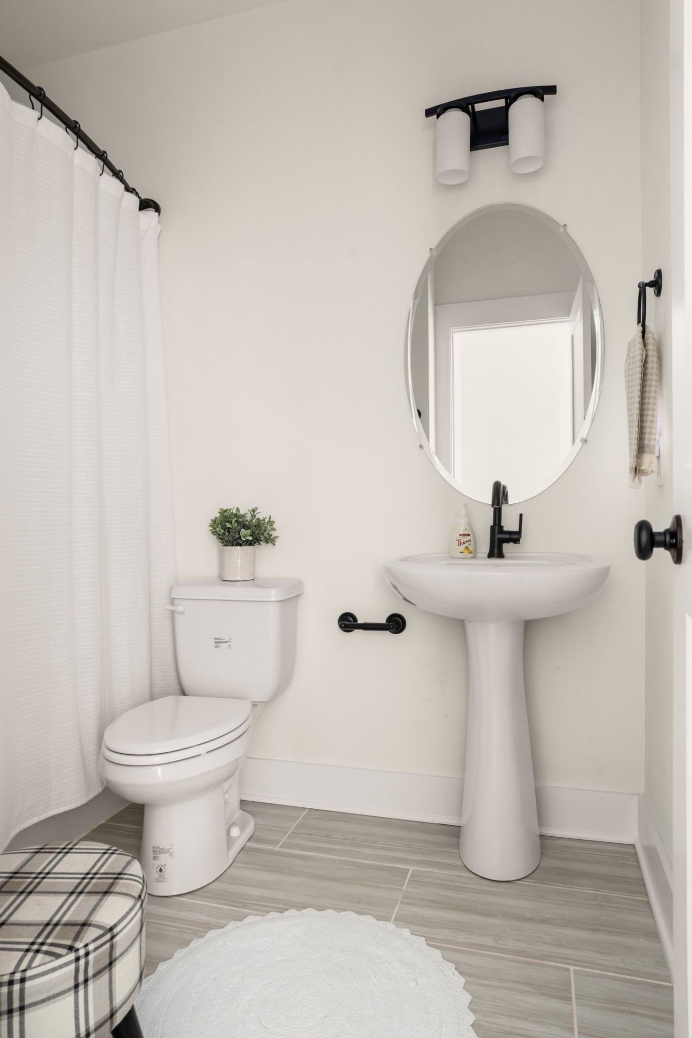 3024 Shandor St Spring Hill Spring Hill, TN 37174 - Photo 38 of 63 a bathroom with a sink toilet and mirror