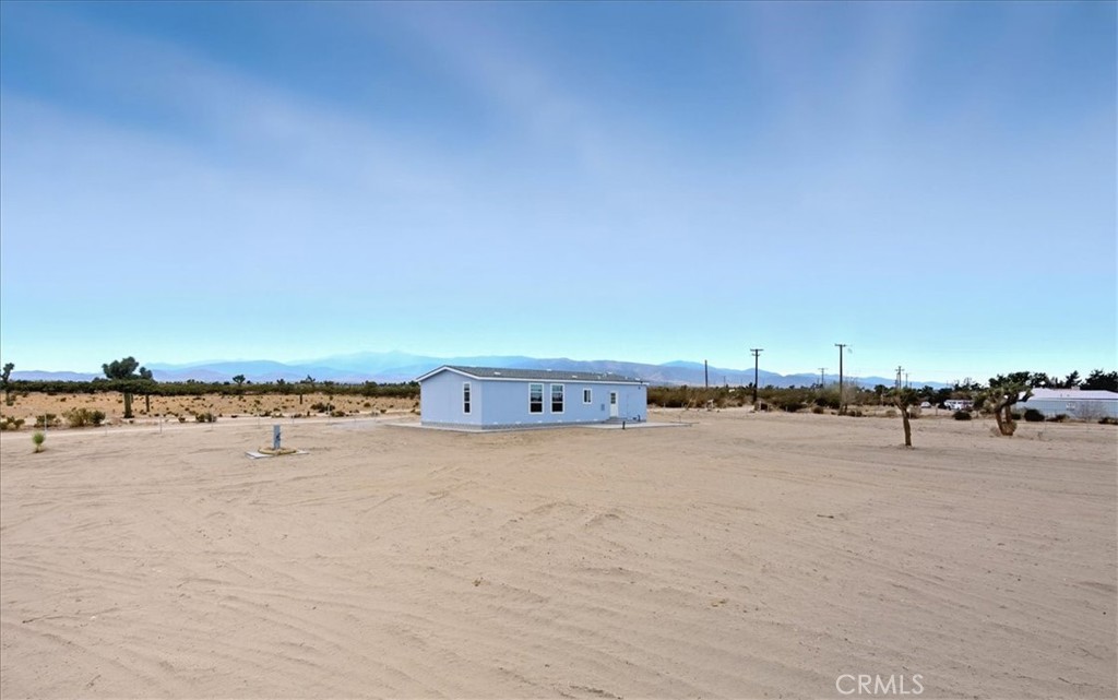 5430 Luna Road Phelan, CA 92371 - Photo 5 of 34 a view of beach and ocean view