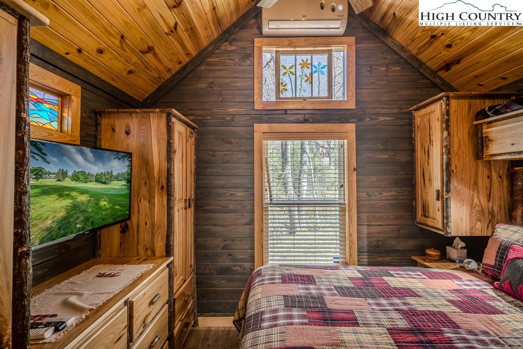 793 Highland Hills Road Newland, NC 28657 - Photo 21 of 40 a front view of a house with a yard