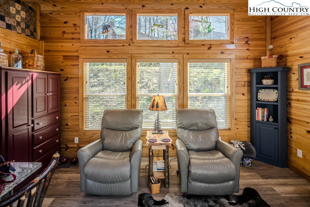 793 Highland Hills Road Newland, NC 28657 - Photo 8 of 40 a view of livingroom with furniture and large windows