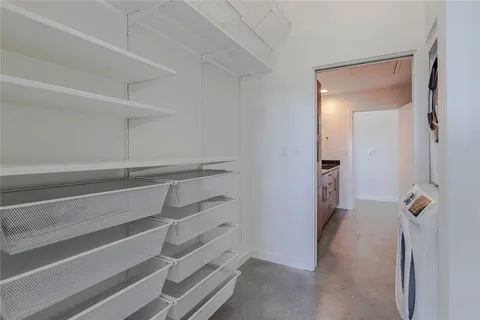 a view of a hallway with closet