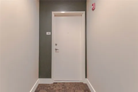 a view of hallway with closet