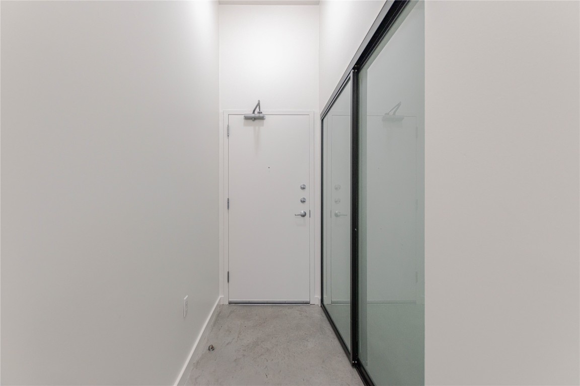 2235 East 6th Street, Unit 404 Austin, TX 78702 - Photo 16 of 37 a view of hallway with closet